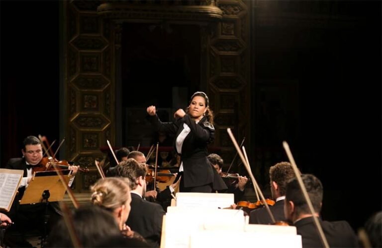 OSMG apresenta Concerto em homenagem ao Dia Internacional da Mulher Mãe Terra, com regência da maestra Cibelle Donza, no Palácio das Artes, BH
